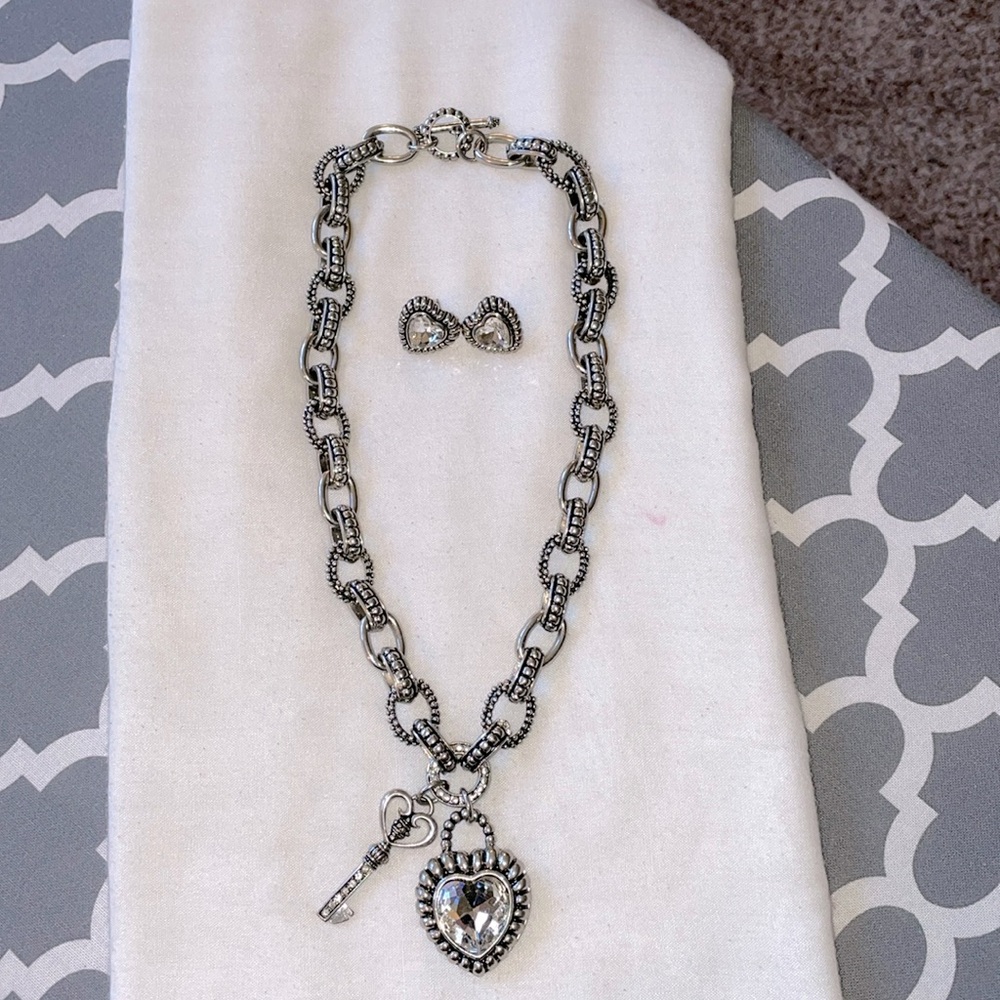 Silver toned heart shaped crystal  pendant necklace / heart shaped earrings